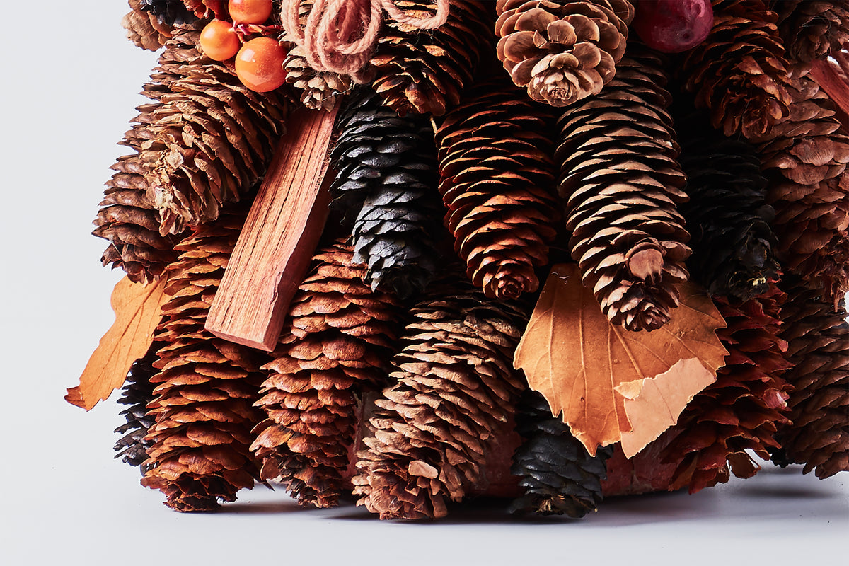 Handcrafted Tree with Pinecones and Wood Chips