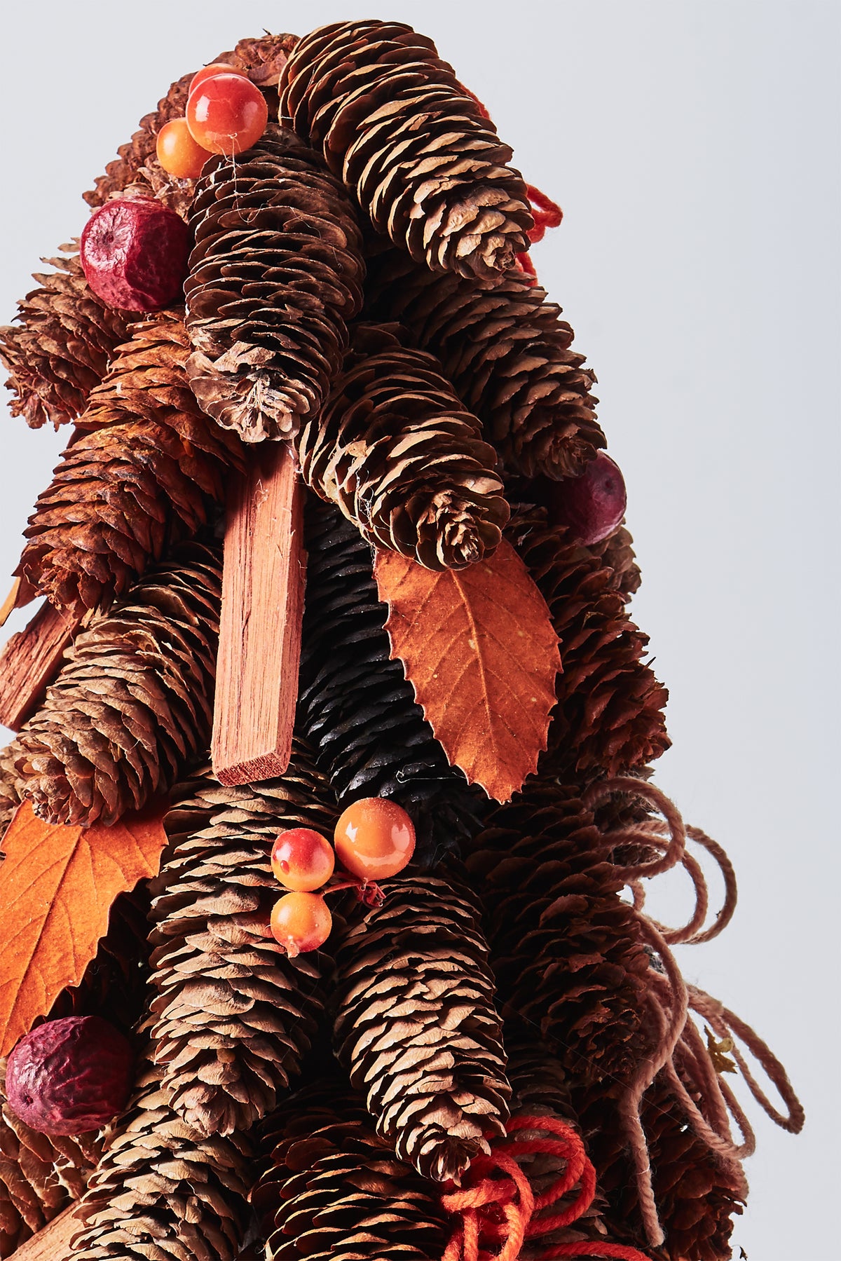 Handcrafted Tree with Pinecones and Wood Chips