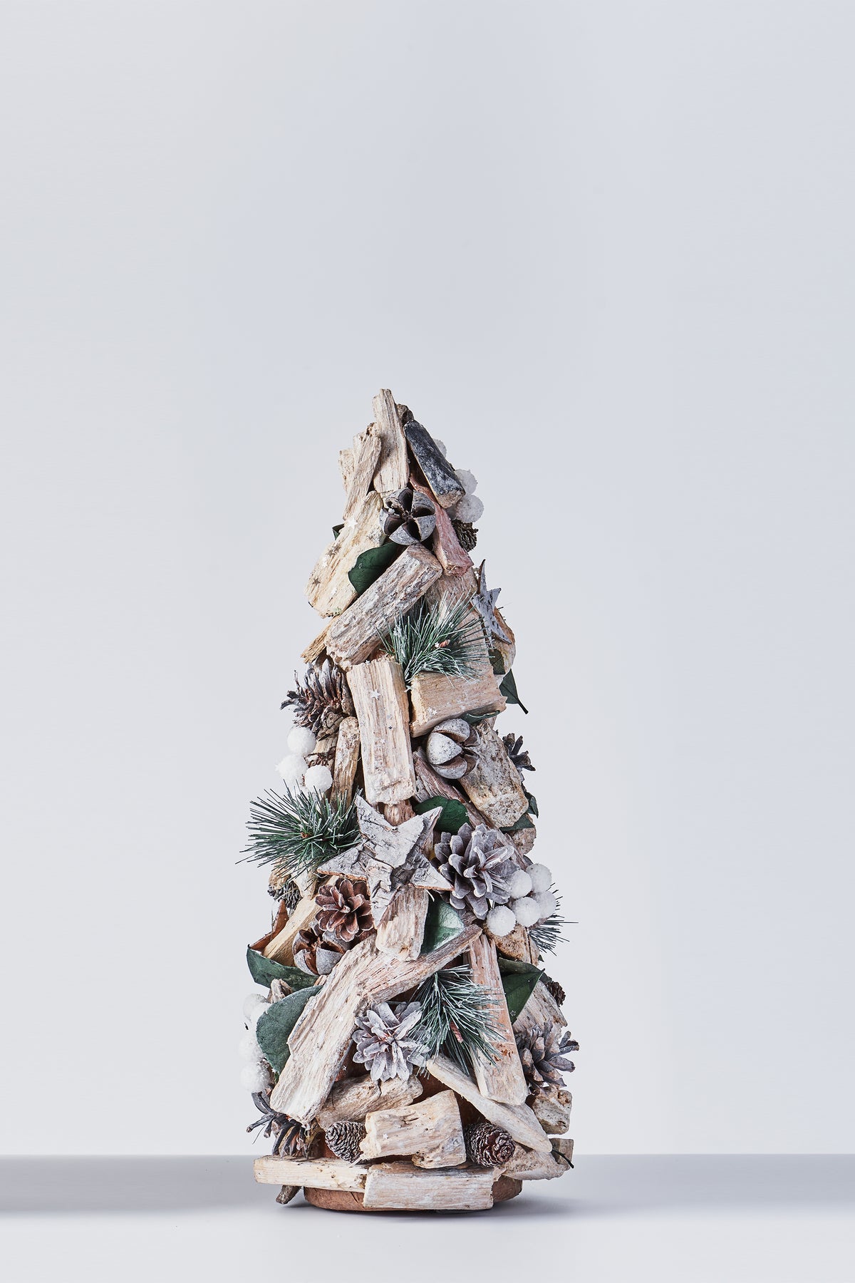 Handcrafted Christmas Tree with Pinecones and Wood Chips